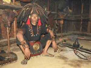 Naga warrier cooking in Northeast India