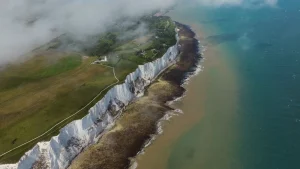 England coastal cliffs maritime history Dramatic coastal cliffs in England highlighting maritime history and coastal landscapes